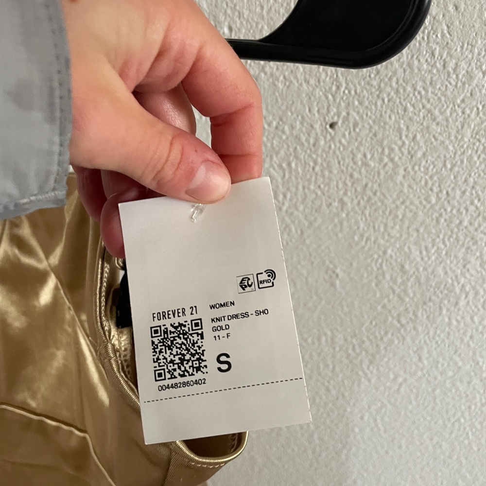 SOLD brand new forever 21 gold dress size small